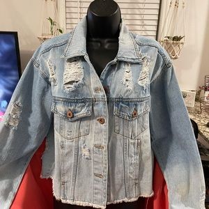 Distressed denim jacket